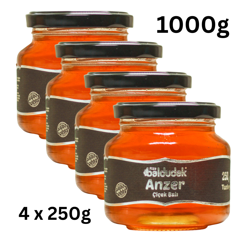 Vier Gläser Baldudak Anzer-Honig mit goldener Farbe – natürlich gesund & stärkend online bestellen für Immunsystem & Energie.